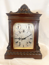 Load image into Gallery viewer, A Large Mahogany Mounted Striking Table Clock With Silvered Dial