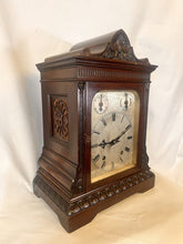 Load image into Gallery viewer, A Large Mahogany Mounted Striking Table Clock With Silvered Dial