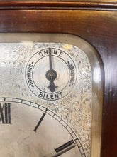 Load image into Gallery viewer, A Large Mahogany Mounted Striking Table Clock With Silvered Dial