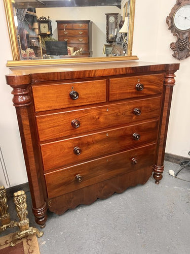 An Impressive Large Flame Mahogany Scotch Chest Flanked With Octagonal Columns
