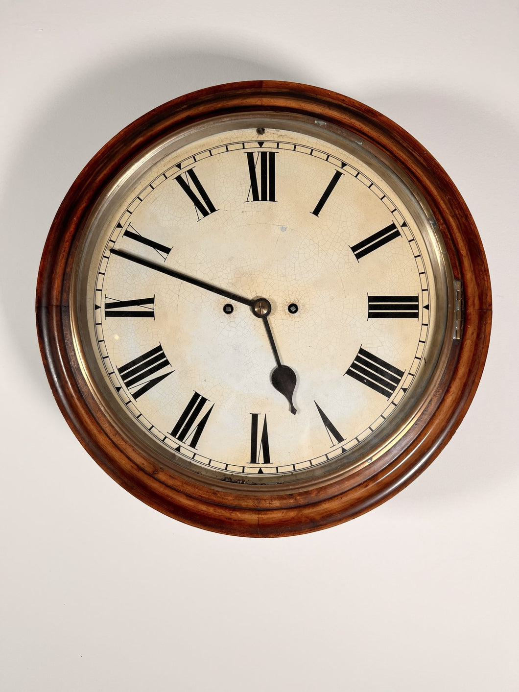 An immaculate large mahogany cased twin Fusee Striking wall clock housed in a mahogany case