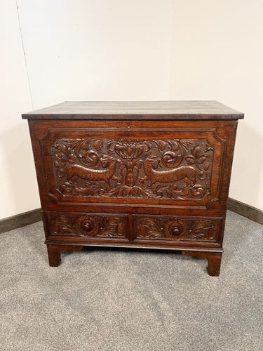 A Richly Patinated “Boarded Chest” With Small Proportions Having Elizabethan Deep Hold Carving