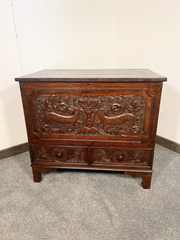 A Richly Patinated “Boarded Chest” With Small Proportions Having Elizabethan Deep Hold Carving