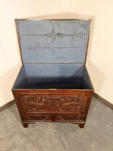 A Richly Patinated “Boarded Chest” With Small Proportions Having Elizabethan Deep Hold Carving