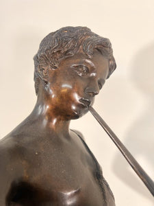 A Large Bronze Sculpture “Boy Playing The Flute” After The Work Of Sculpture Auguste Moreau (French, 1834-1917)