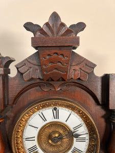 An Ansonia Twin Train Mantel Clock With A White Dial Chapter Ring