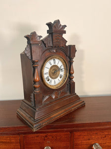 An Ansonia Twin Train Mantel Clock With A White Dial Chapter Ring