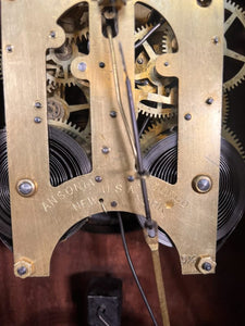 An Ansonia Twin Train Mantel Clock With A White Dial Chapter Ring