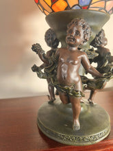 Load image into Gallery viewer, A Widdop Bingham And Co Bronze Figural Table Lamp With Tiffany Stained Glass Shade