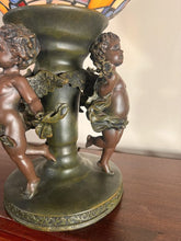 Load image into Gallery viewer, A Widdop Bingham And Co Bronze Figural Table Lamp With Tiffany Stained Glass Shade