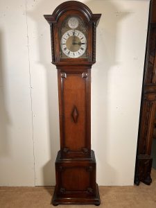 A Lovely Long Cased Tempus Fugit Oak Clock With Westminster Chime