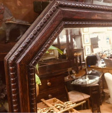 Load image into Gallery viewer, Gorgeous Edwardian mahogany mirror with amazing patina and amazing carving to the frame