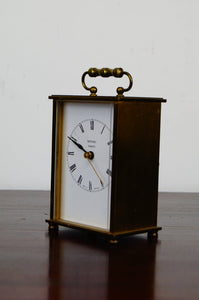 Brass carriage clock made by Metamec of Great Britain engraved on the rear