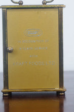 Load image into Gallery viewer, Brass carriage clock made by Metamec of Great Britain engraved on the rear