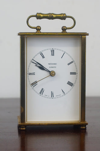 Brass carriage clock made by Metamec of Great Britain engraved on the rear