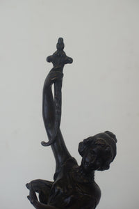 A graceful Victorian bronze statue of a beautiful girl holding a sword