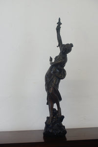 A graceful Victorian bronze statue of a beautiful girl holding a sword