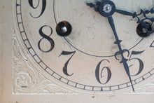 Load image into Gallery viewer, A mahogany mantle clock with the most fabulously engraved face