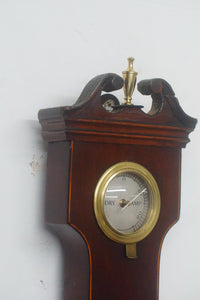 We have for sale an antique 18th century George III inlaid mahogany banjo barometer