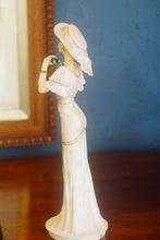 Load image into Gallery viewer, Hand made and hand decorated Royal Doulton figurine by Timothy Potts &quot;At The Races&quot;