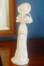 Load image into Gallery viewer, Hand made and hand decorated Royal Doulton figurine by Timothy Potts &quot;At The Races&quot;