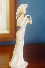 Load image into Gallery viewer, Hand made and hand decorated Royal Doulton figurine by Timothy Potts &quot;At The Races&quot;