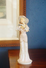 Load image into Gallery viewer, Hand made and hand decorated Royal Doulton figurine by Timothy Potts &quot;At The Races&quot;