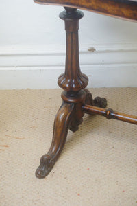 We have a fantastic quality mid Victorian burr walnut stretcher table being serpentine in form