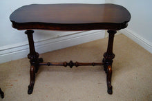 Load image into Gallery viewer, We have a fantastic quality mid Victorian burr walnut stretcher table being serpentine in form