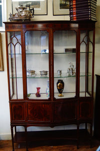 An antique Edwardian quality mahogany inlaid serpentine front display cabinet c.1900