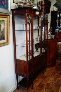 An antique Edwardian quality mahogany inlaid serpentine front display cabinet c.1900