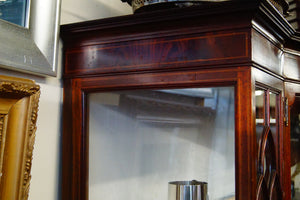 An antique Edwardian quality mahogany inlaid serpentine front display cabinet c.1900