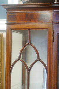 An antique Edwardian quality mahogany inlaid serpentine front display cabinet c.1900