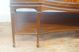 An antique Edwardian quality mahogany inlaid serpentine front display cabinet c.1900