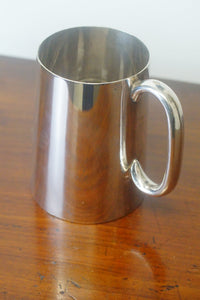 A superb antique sterling silver pint mug or tankard with a glass bottom hallmarked on the base