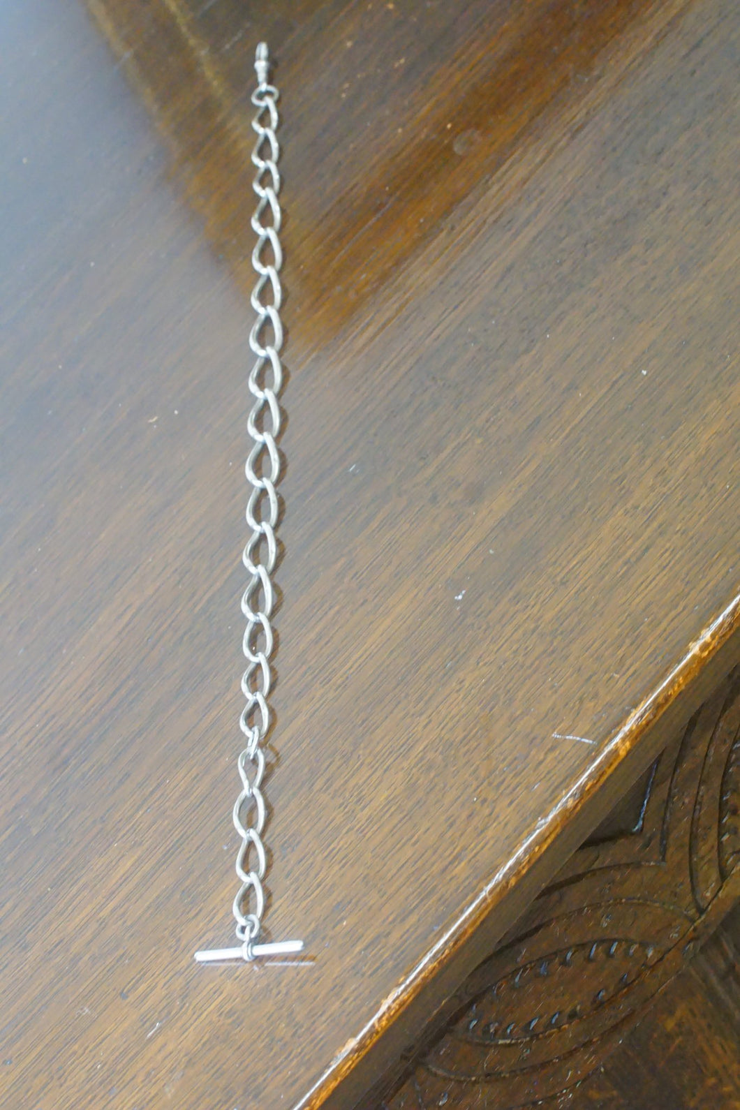 Sterling silver curved link watch chain with hallmarks for Birmingham  by Henry Pope Birmingham 1911