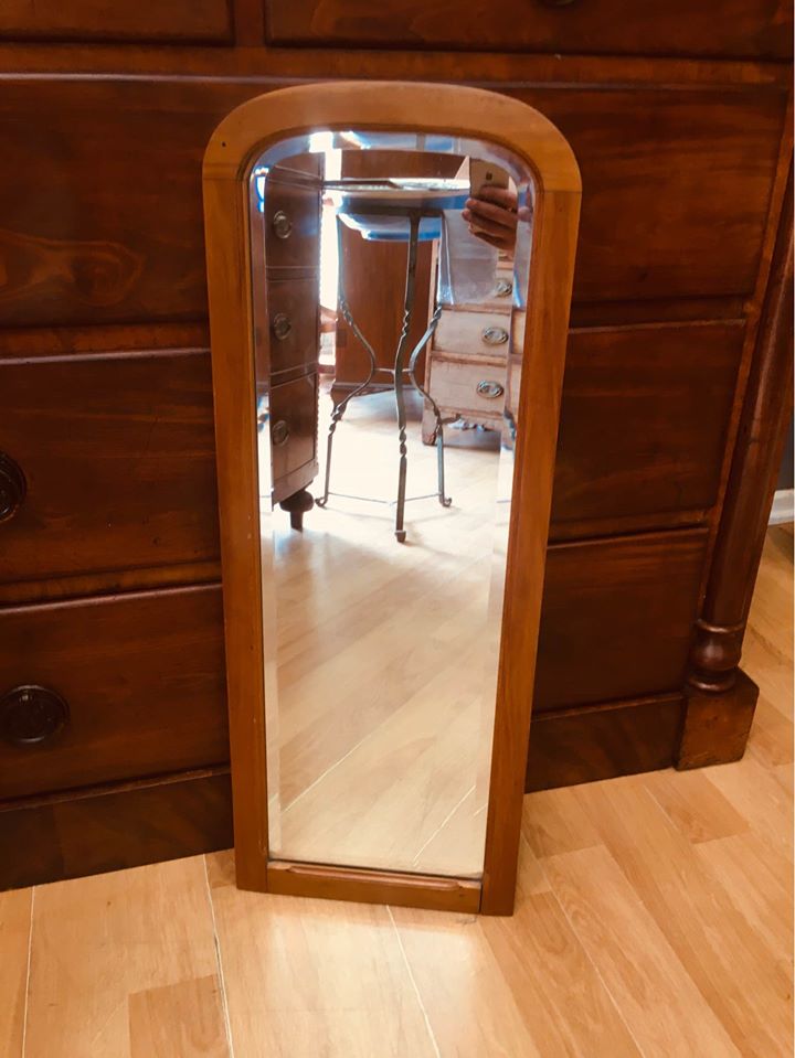 Oak mirror with a beautiful carving and doubled beveled glass