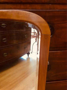 Oak mirror with a beautiful carving and doubled beveled glass