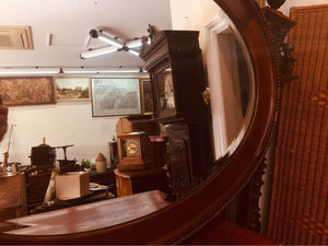 Edwardian mahogany oval mirror with double beveled edge in beautiful condition