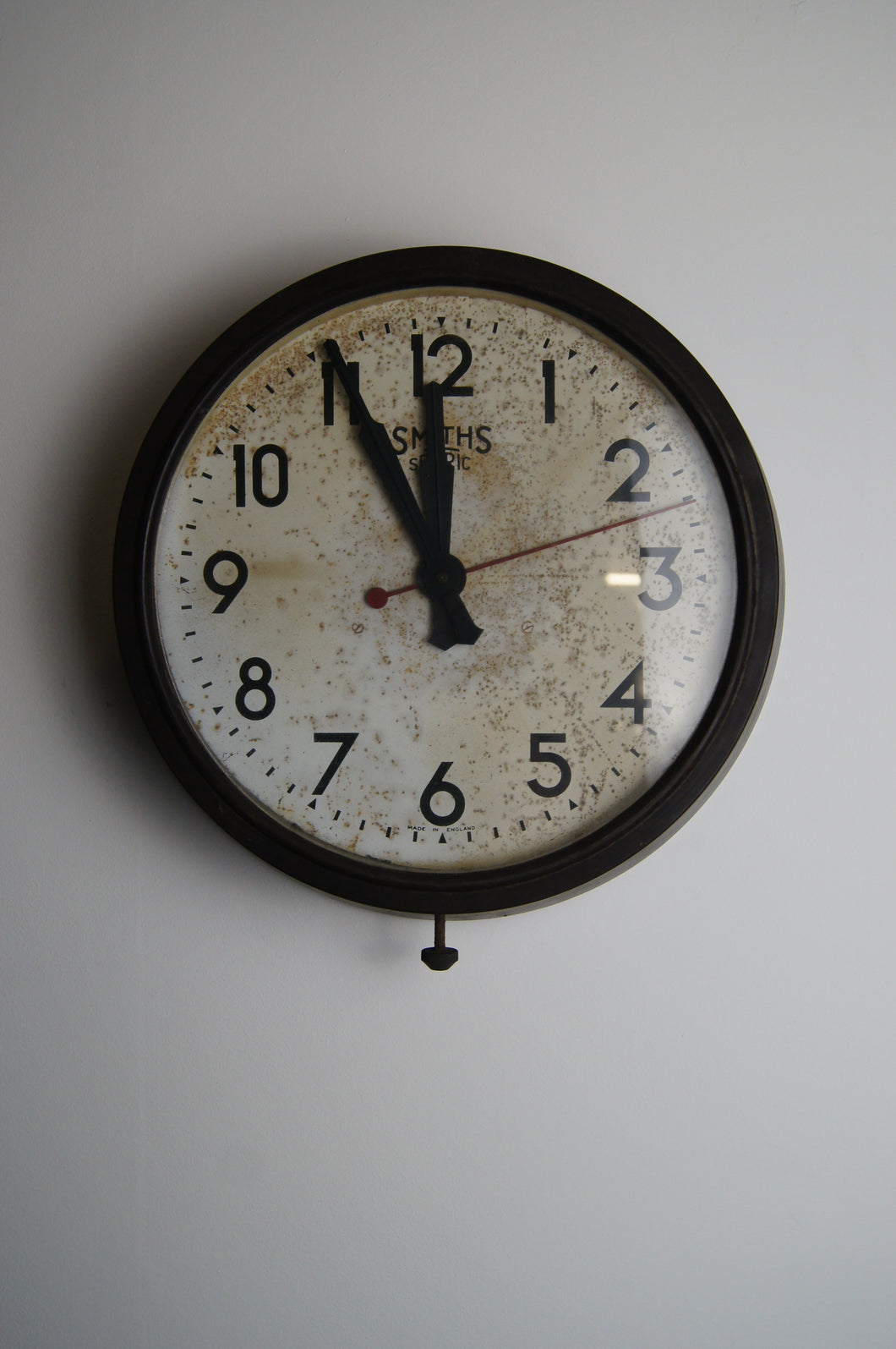 A Smiths Bakelite station clock with seconds hand circa 1940 in great condition with lovely patina