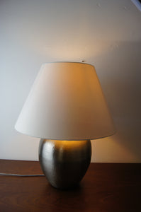 Lovely metal lamp with hand beaten detail to base and gorgeous shade